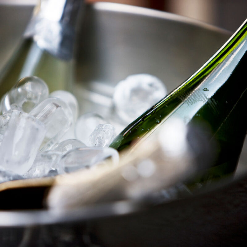 Bottles of wine in a cooler for Christmas and New Year's eve parties at the Whippet Inn